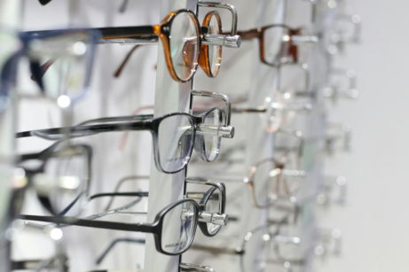 silver-framed-eyeglasses-on-clear-glass.jpg silver framed eyeglasses on clear glass
